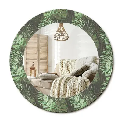 Miroir rond avec décoration feuilles tropicales