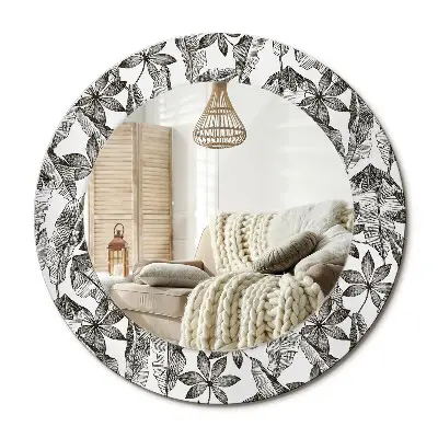 Miroir rond avec décoration feuilles tropicales