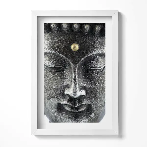 Tableau avec cadre Tête d'une statuette de Bouddha